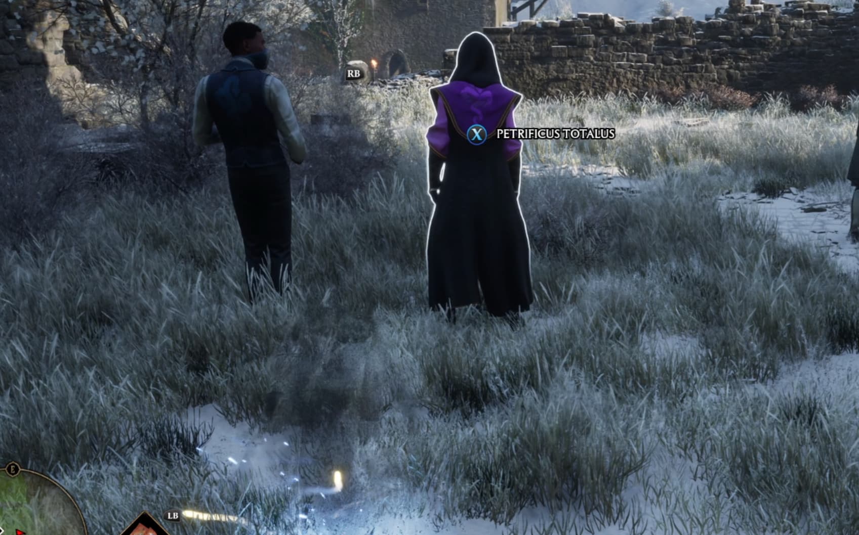 A screenshot from Hogwarts Legacy shows a character with the X button prompt behind his back, with Petrificus Totalus next to it.