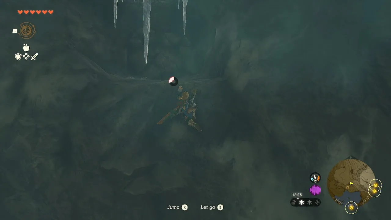 Link climbing a ledge.