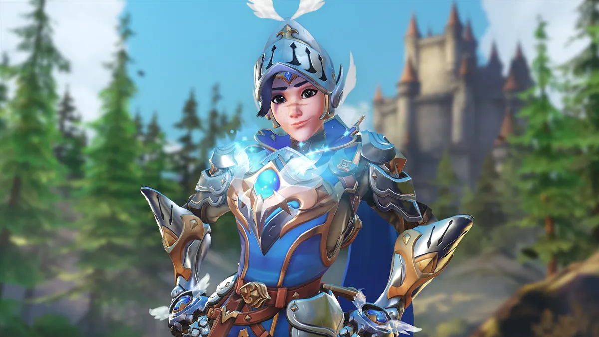 Tracer, wearing her Mythic Adventurer skin, poses outside Eichenwalde in Overwatch 2.