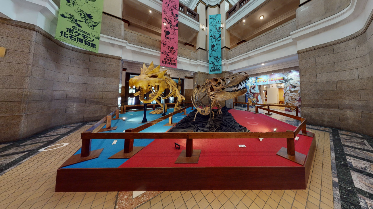 Skeletal models of Tyrantrum and the Tarbosaurus at the Pokémon Fossil Museum.