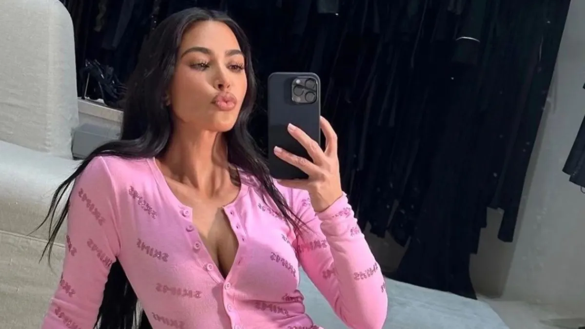 Kim Kardashian pouting and taking a selfie