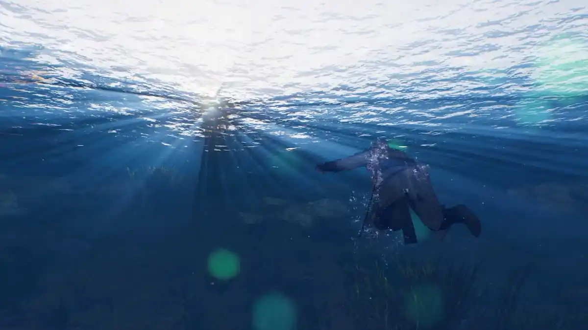 basim swimming in deep blue water and looking up at the light shining through