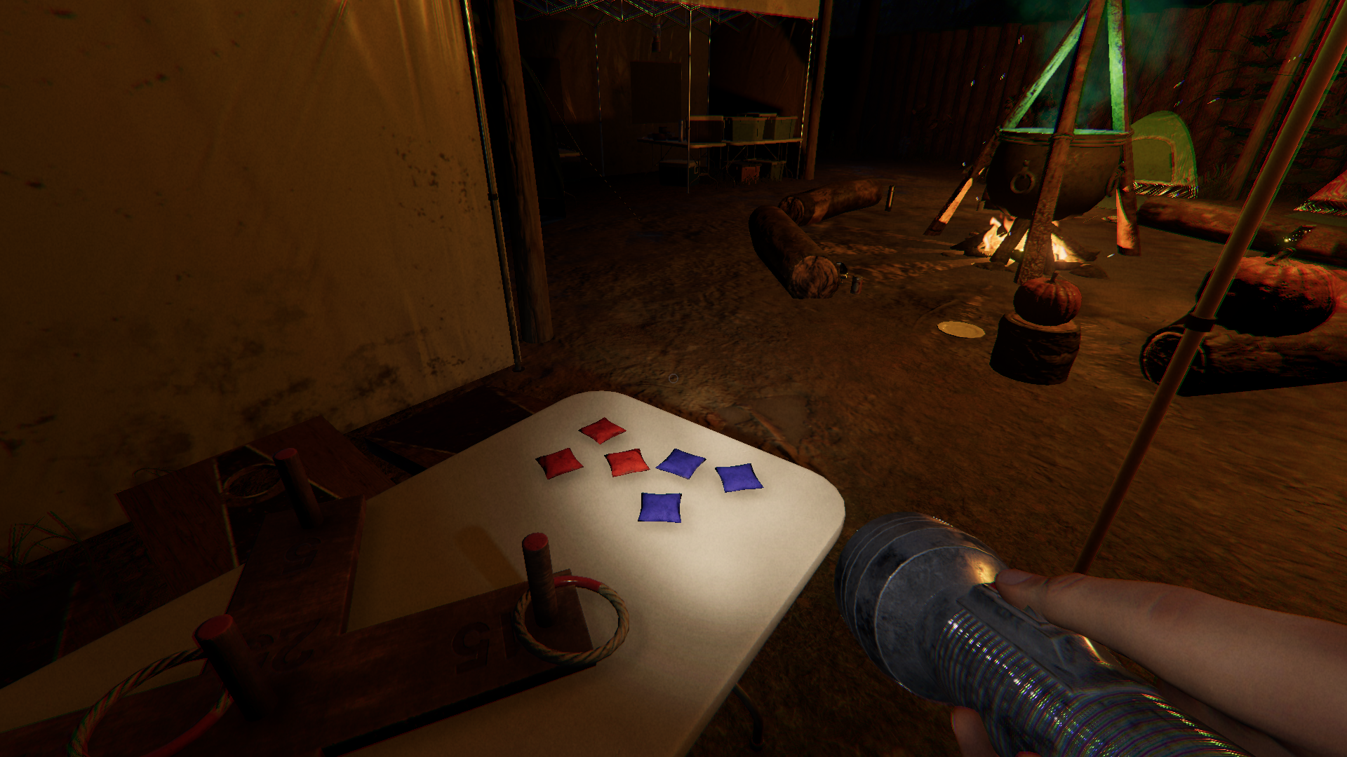 Three red and three blue bean bags on a table.