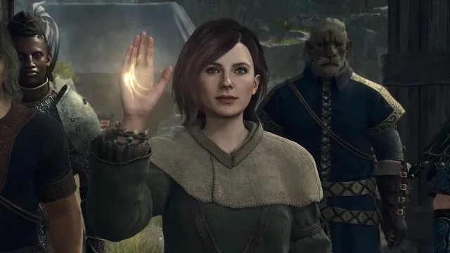 A woman holds her hand up, a golden light glowing from it. Two men stand behind her in Dragon's Dogma 2.