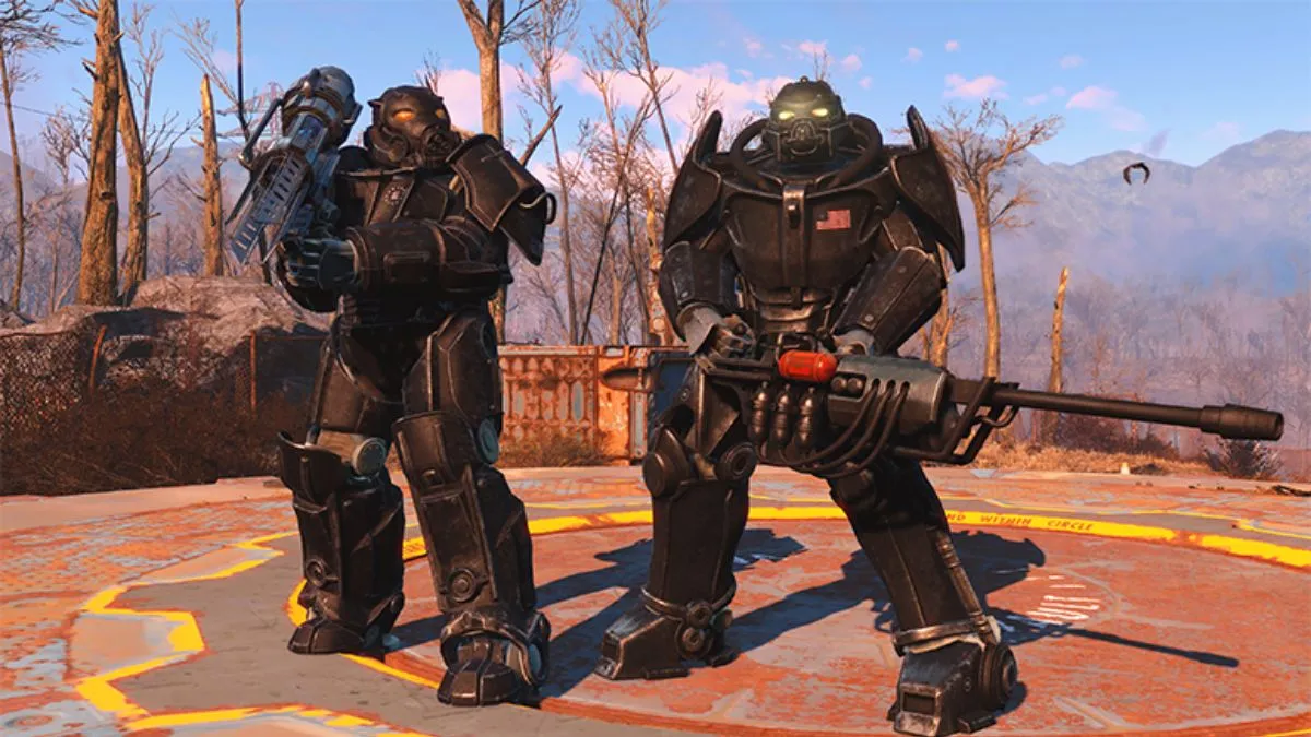 Two characters wearing power armor in fallout, both of them wielding huge guns.