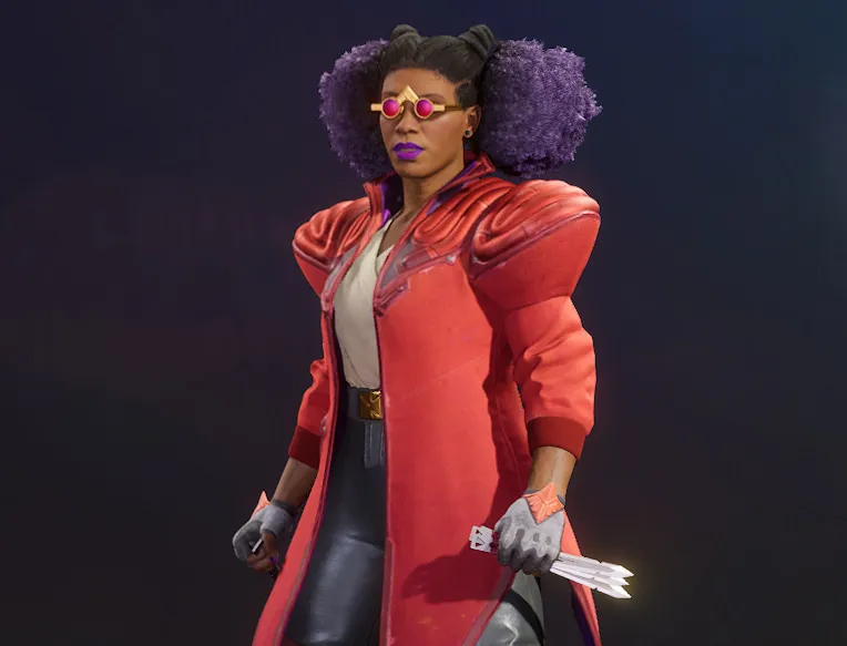 Bazz Concord, a woman in a long red coat and small purple glasses.