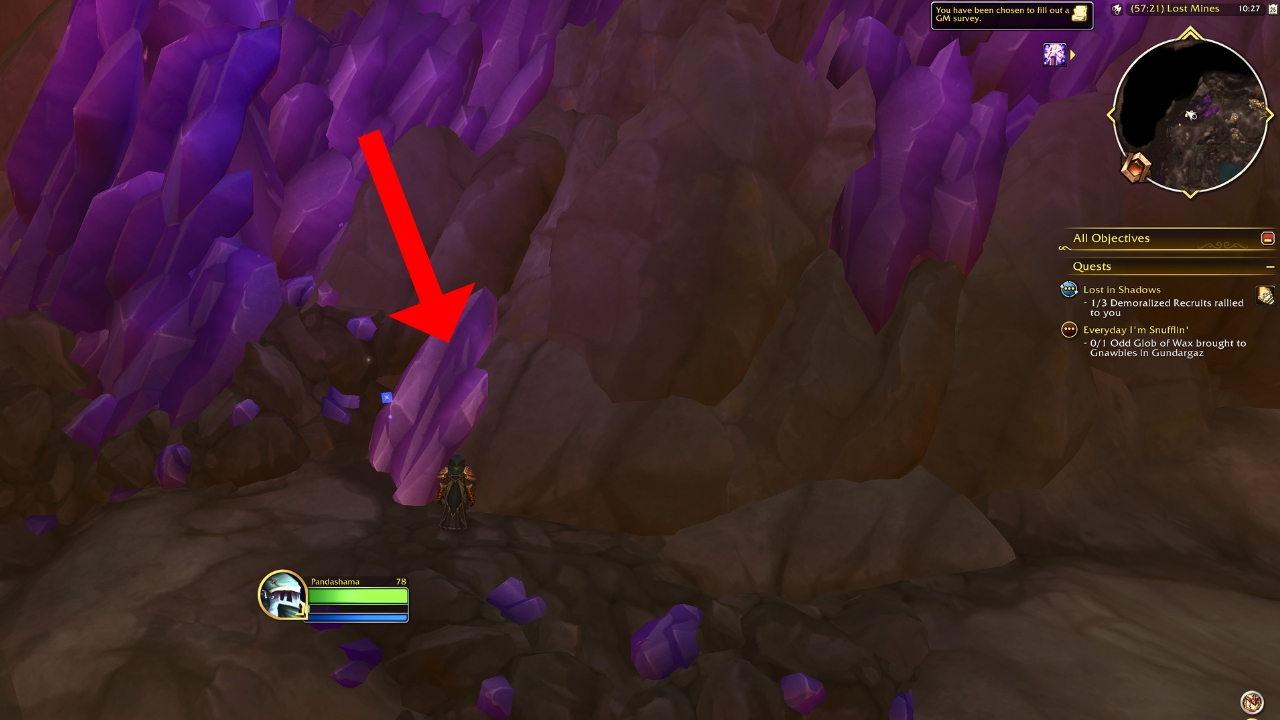 A red arrow pointing to the amethyst gem for dusty prospectors chest wow the war within