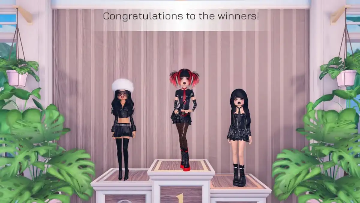 Three winners standing on the pedestal in Roblox Dress To Impress.