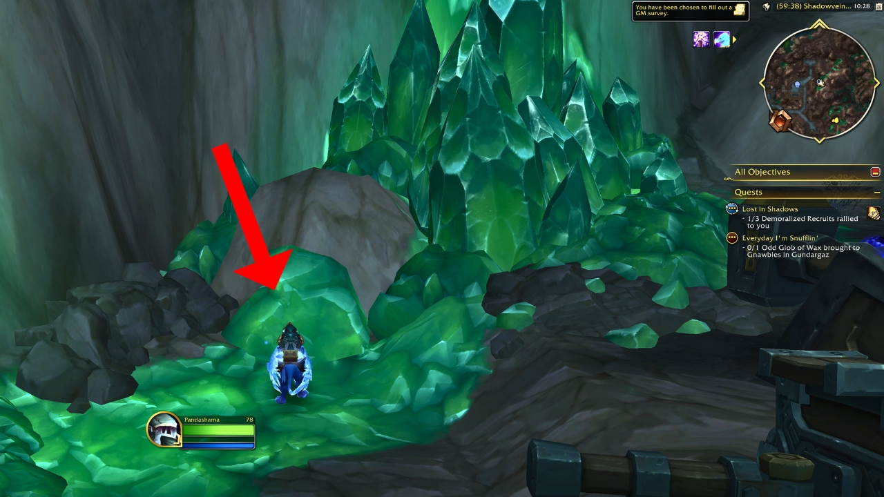 A red arrow pointing to the emerald gem for dusty prospectors chest wow the war within