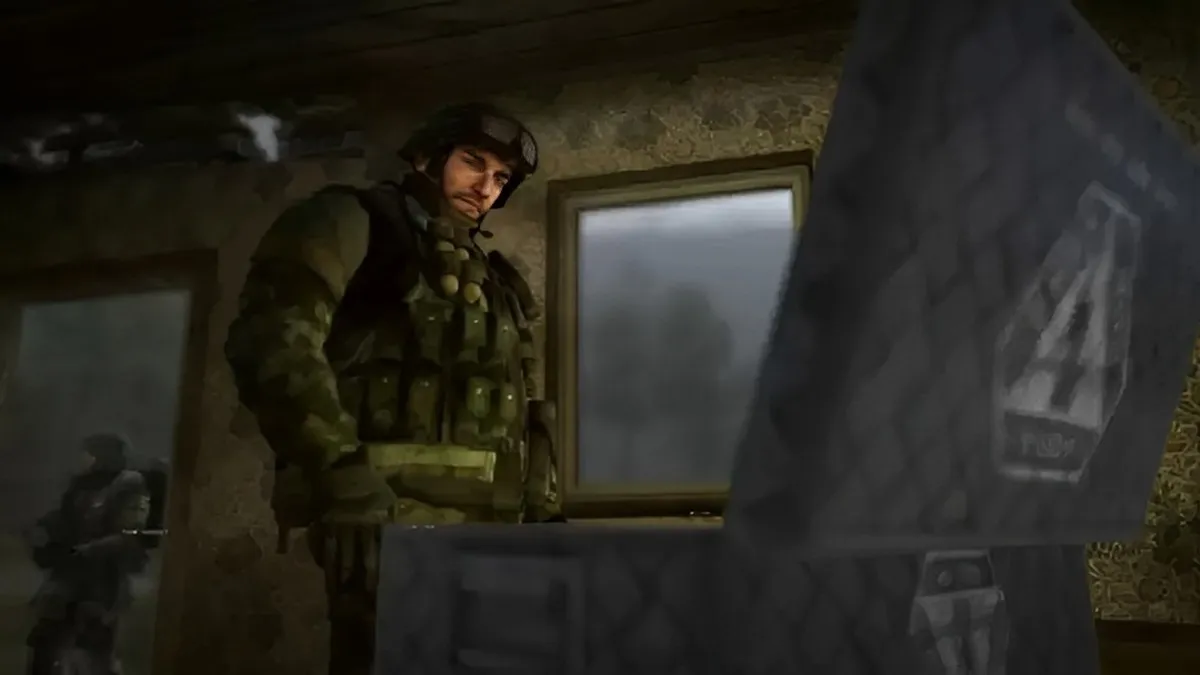 Soldier standing up looking at an open briefcase in a room in Battlefield Bad Company