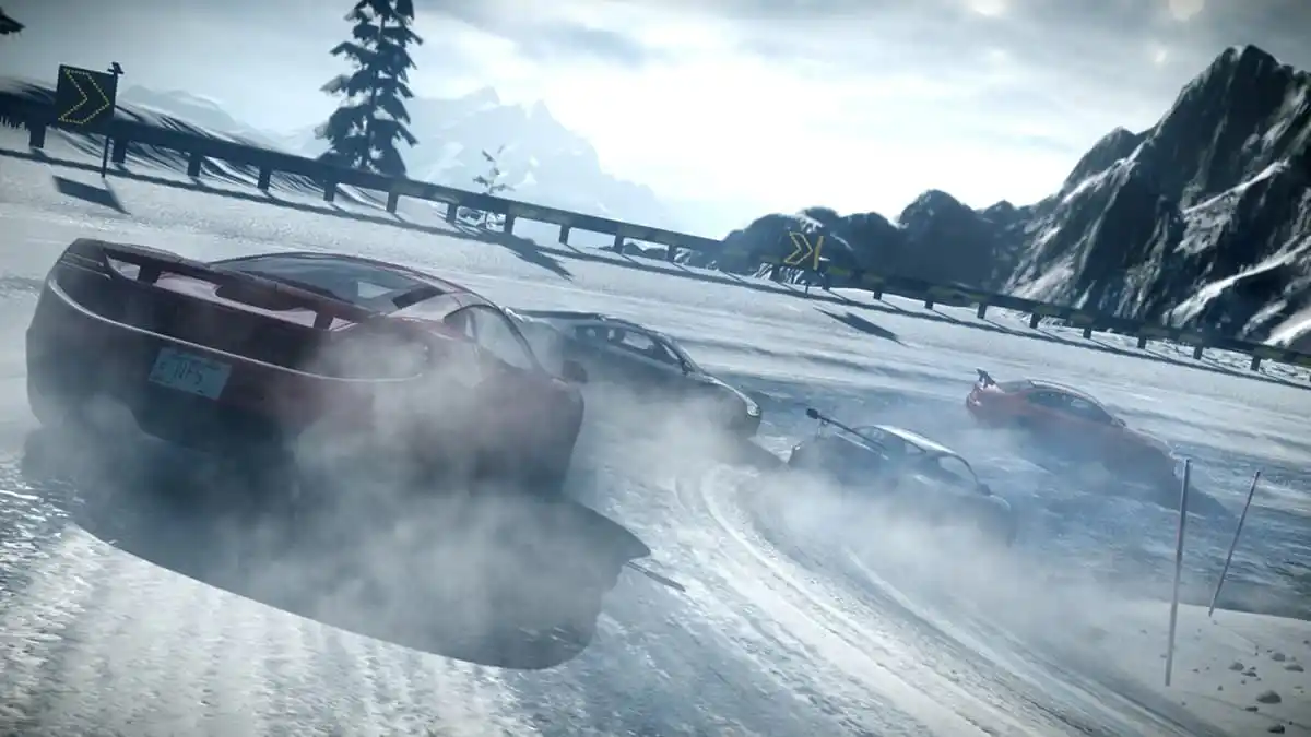 Four cars racing through the icy elevated road with mountains in the background