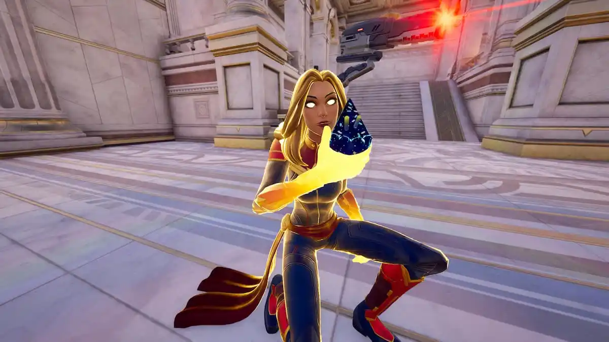 Captain Marvel holding a slice of cake in Fortnite.