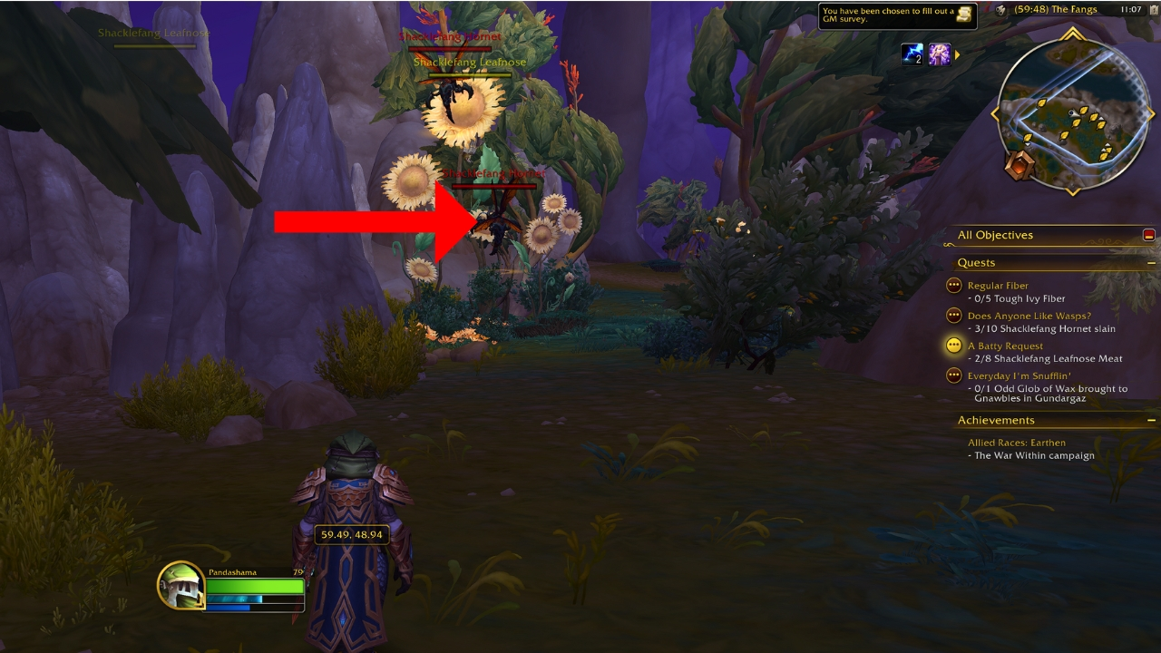 A red arrow pointing to a shacklefang hornet in wow the war within