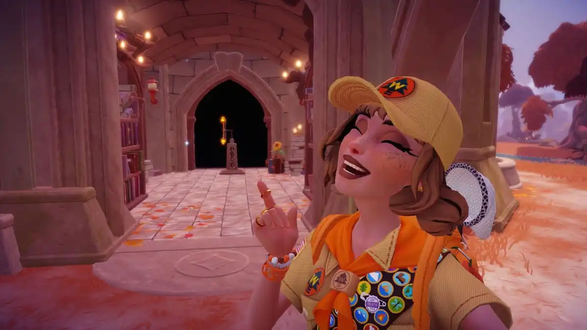 The player smiling and pointing at a hidden room beneath a bridge in The Bind in Disney Dreamlight Valley. 