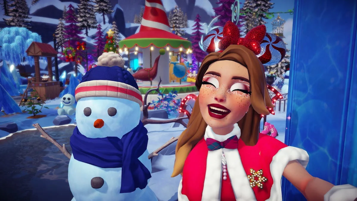 A player with red and silve candy cane minnie ears smiling with their eyes closed while taking a picture with a snowman that has a blue hat and scarf in Disney Dreamlight Valley.