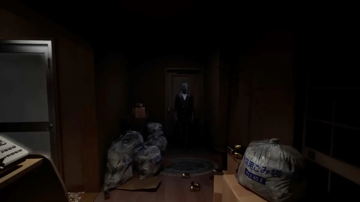 A spirit standing at the front door, next to a pile of trash bags