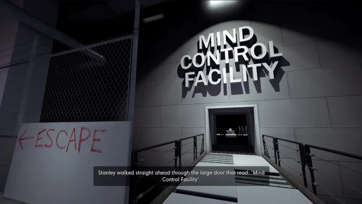 The Mind Control Facility entrance with the word Escape etched on the wall next to it