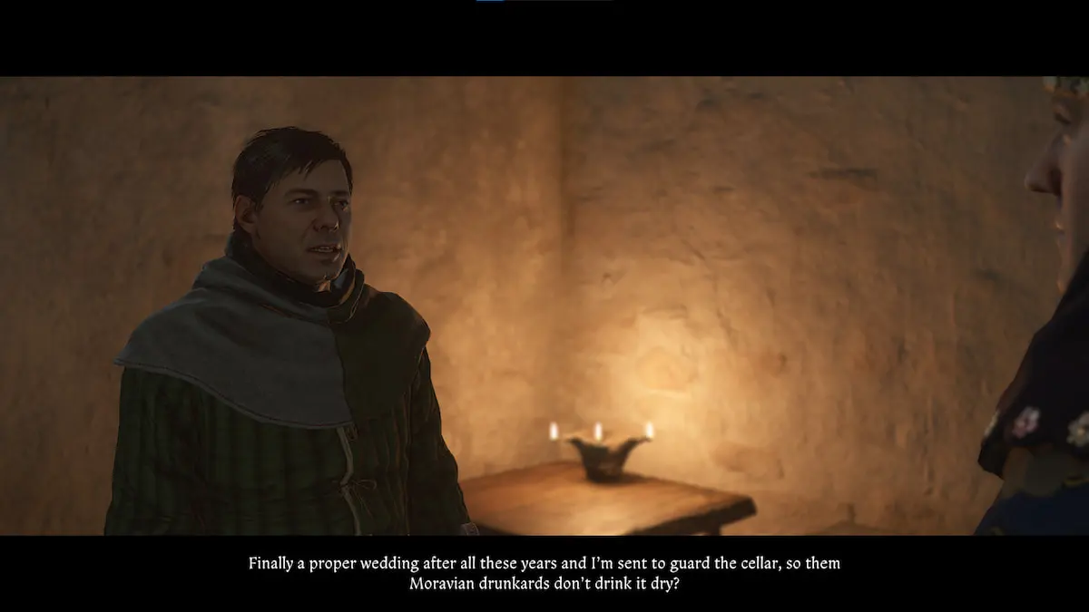 A man in a doublet speaks in a candlelit room.