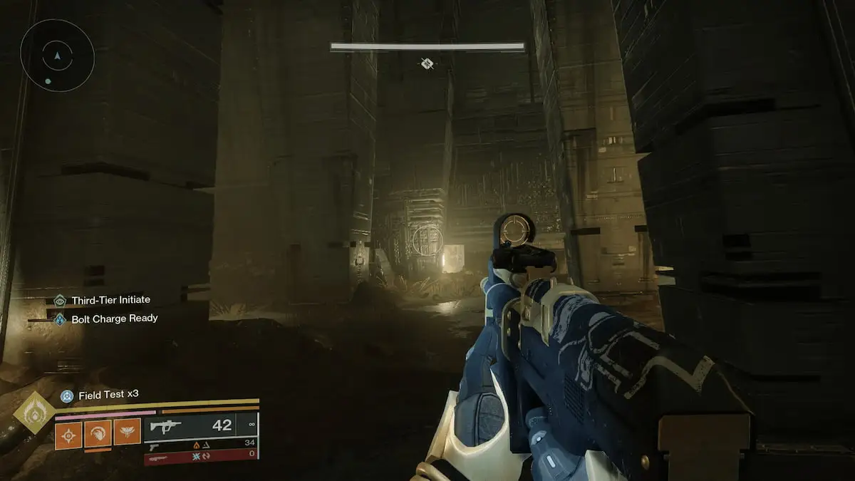 A guardian points at a small ledge that looks slightly different from the wall they're aiming at.