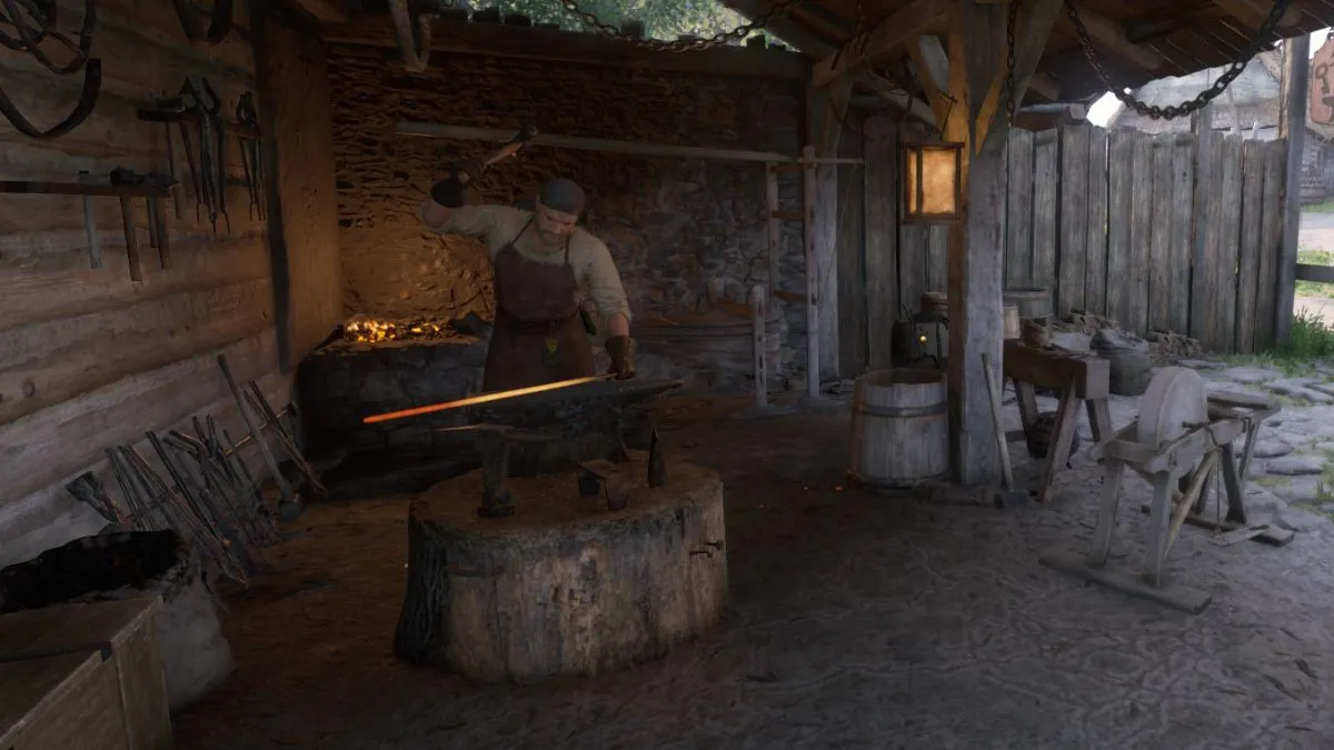 Blacksmith hammering at an anvil in Kingdom Come: Deliverance 2.