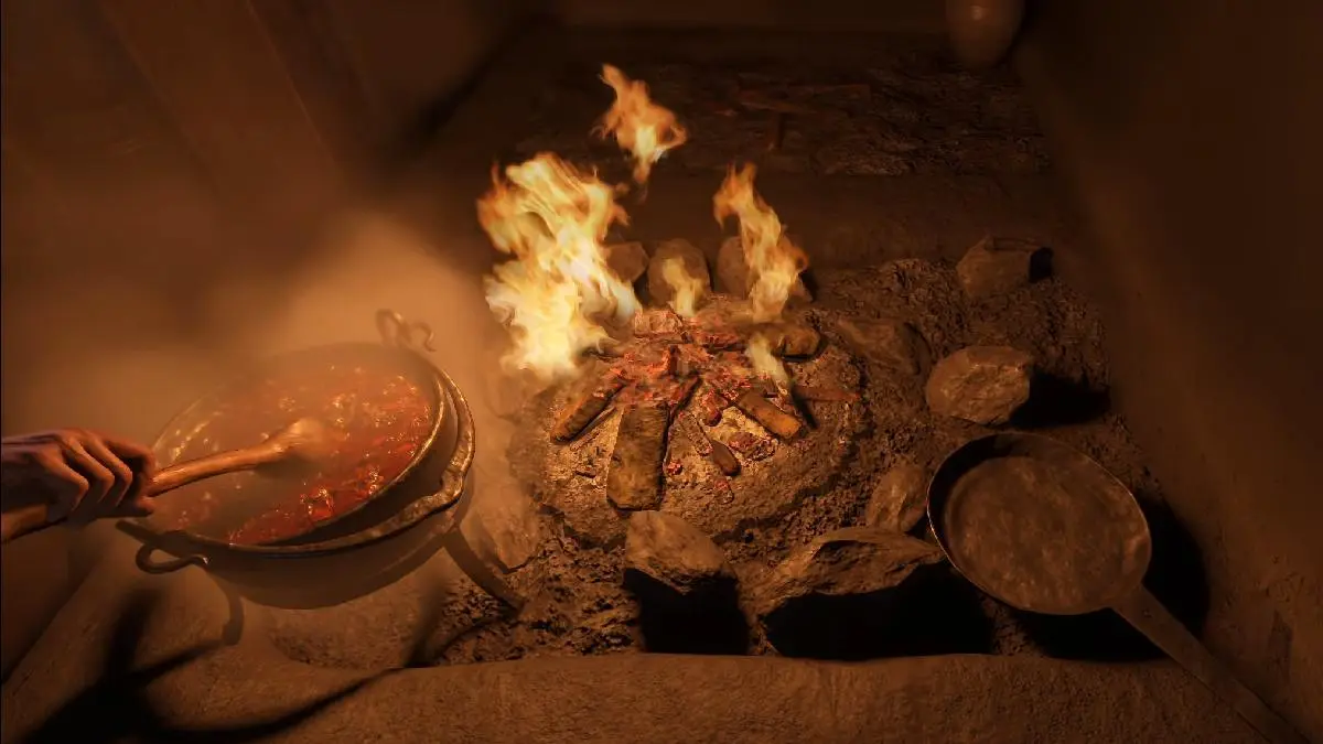 Kingdom Come Deliverance 2 cooking at fire.