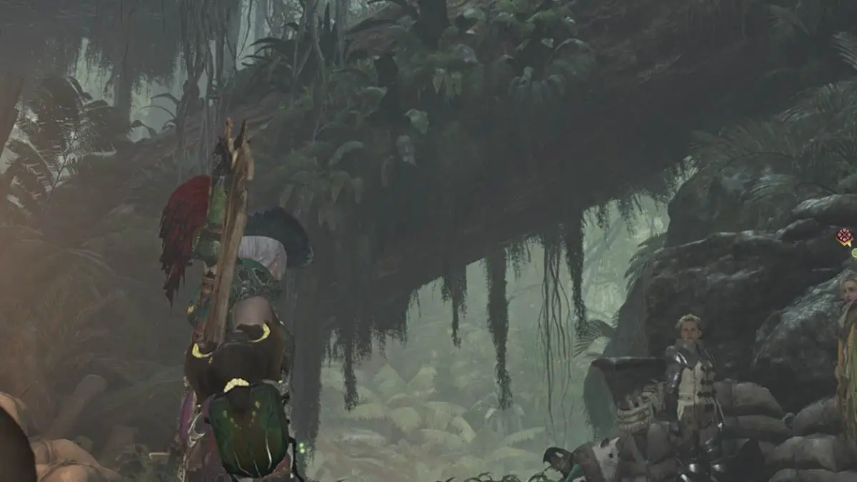 Hunter looking out at the forest in Monster Hunter Wilds.