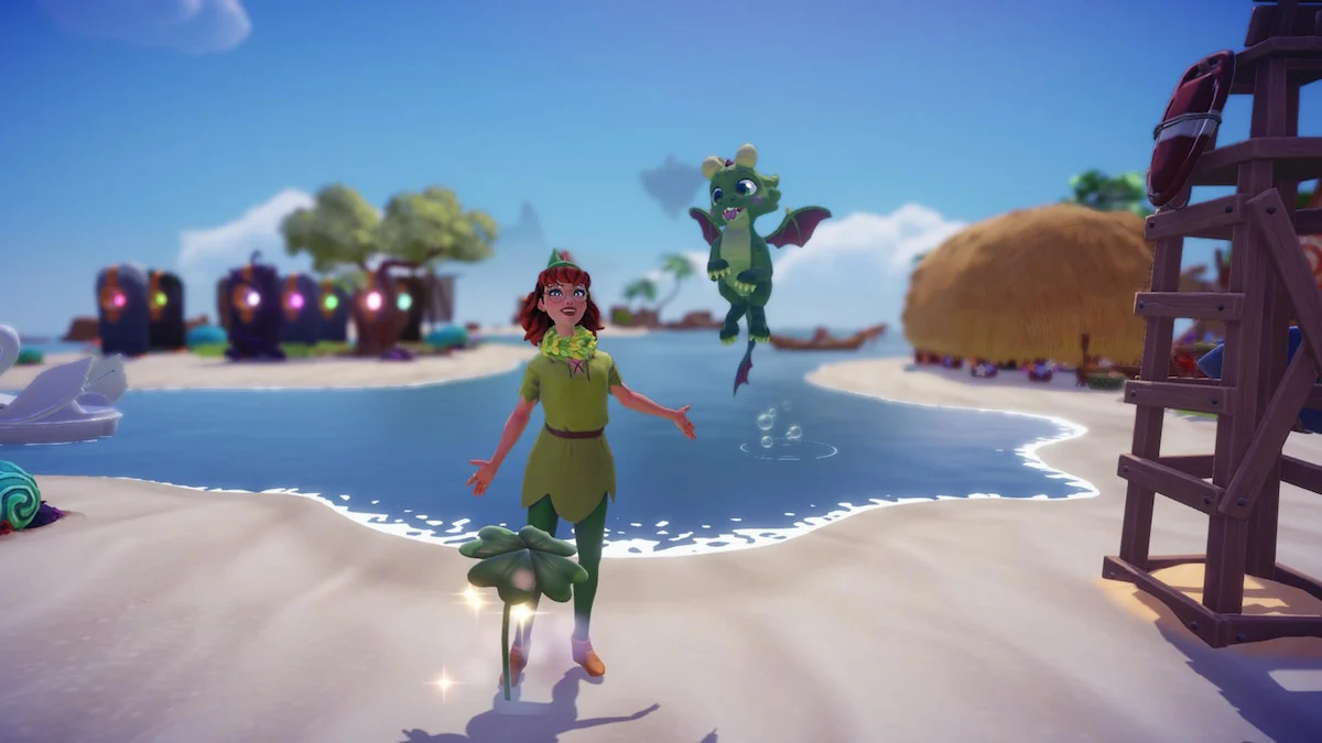 A player wearing a green peter pan outfit standing by a four-leaf clover on the beach in Disney Dreamlight Valley.